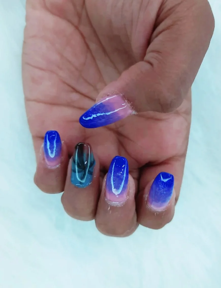 Mesmerizing Blue Ombre Nail Art with a Bold Twist 💙✨