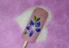 Blue Blossom Floral Nail Art on Nude Base – A Hand-Painted Beauty