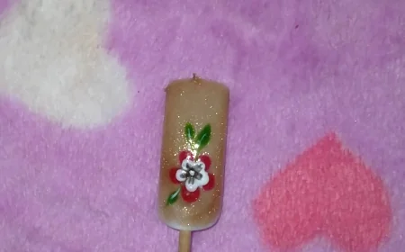 Red & White Bloom Nail Art on Glitter Nude Base – A Classy Floral Charm