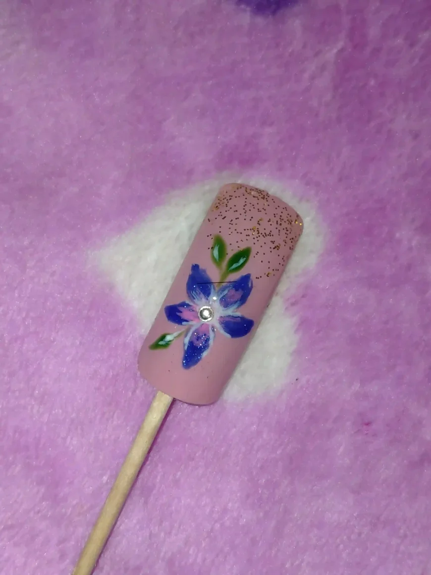 Blue Blossom Floral Nail Art on Nude Base – A Hand-Painted Beauty