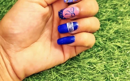 Royal Blue & Silver Glam Nail Art with Marble and Bow Detailing