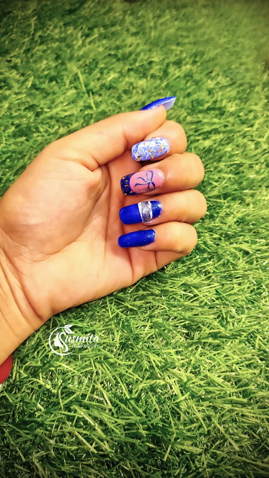 Royal Blue & Silver Glam Nail Art with Marble and Bow Detailing